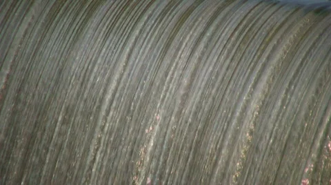 Closeup of waterfall flowing over edge in lines (High Definition) Stock Footage 365137