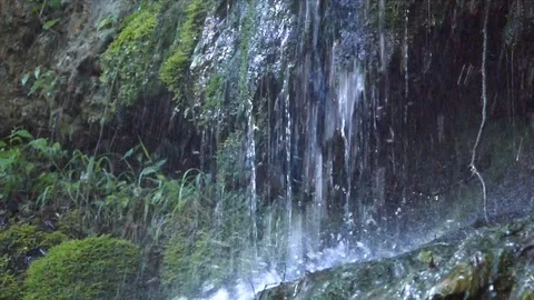 Closeup waterfall jets fall on stones making foamy splashes Stock Footage 101611515