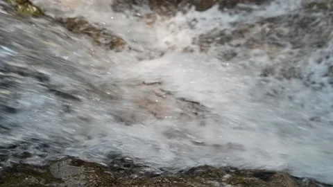 Closeup of a waterfall from a mountain stream (slow motion) Stock-Footage 219647114