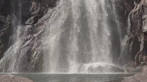 Closeup waterfall in slow motion, bottom of big waterfall on granite Stock Footage 166758987