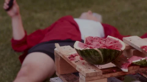Closeup of a watermelon slicing on the table Stock Footage 258312091