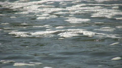Closeup of water's flowing surface as it ripples (High Definition) Stock Footage 364906