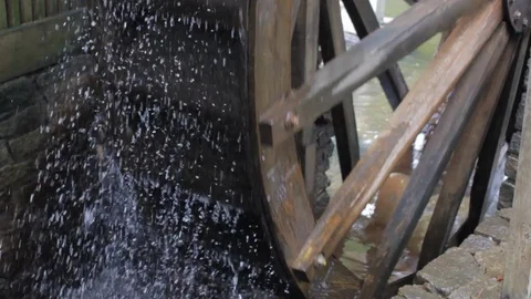A closeup of a waterwheel in slow motion. 動画素材 120124929