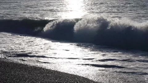 Closeup of Waves crashing against wind at sunset.Fierce water,tumbling wave view Stock Footage 260239535