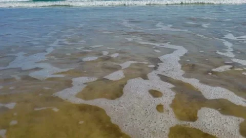 Closeup of Waves over sand- Caribbean, Trinidad &amp; Tobago, West Indies Stock Footage 141550890