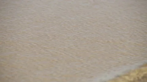 Closeup waves on sandy shore Stock Footage 40450398