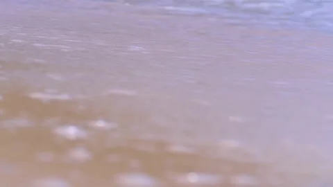 Closeup of waves on tropic beach Stock Footage 230152256