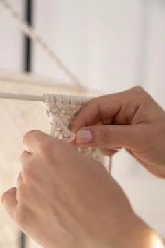 Closeup weaving of macrame threads , women's hands Stock-Fotos