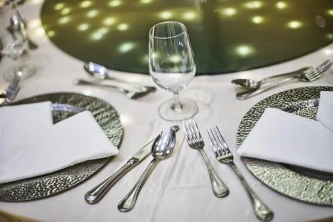 Closeup of wedding reception dinner table setting Stock Photos