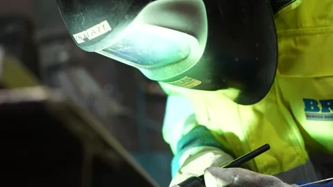 Closeup welder welding helmet Stock Footage 256145069