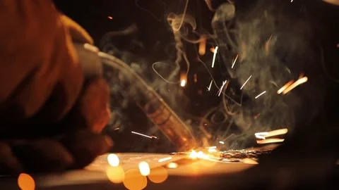 Closeup of a welding machine in work. Worker welds metal. Stock Footage 136310957