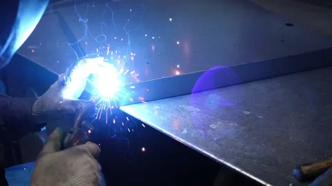 Closeup of a welding machine in work. Worker welds metal. Stock Footage 153662119