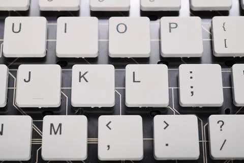 Closeup of a white computer keyboard with a wireless connection Stock Photos