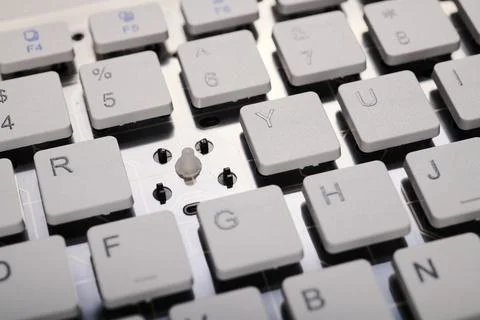 Closeup of a white computer keyboard with a wireless connection Stock Photos