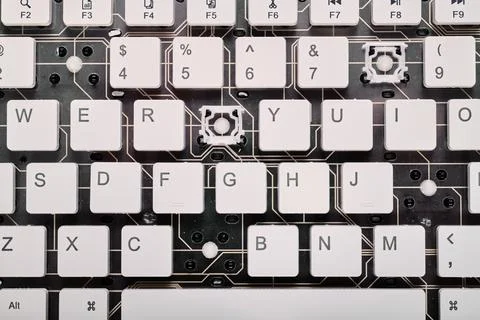 Closeup of a white computer keyboard with a wireless connection Stock Photos