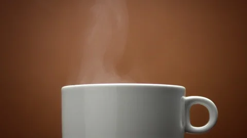 Closeup of white cup with hot drink. Steam from cup 스톡 동영상 86292585
