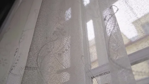 Closeup on white drapes on a window in an apartment Video stock 83843676