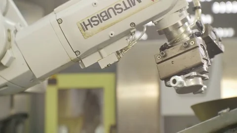 Closeup White High-tech Mitsubishi Robotic Arm Takes Details Stock Footage 78638649