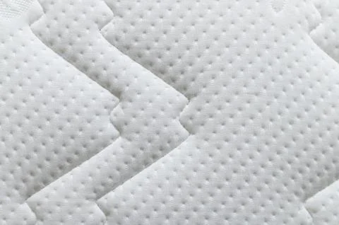 Closeup of white mattress texture background. Material and furniture concep.. Stock Photos