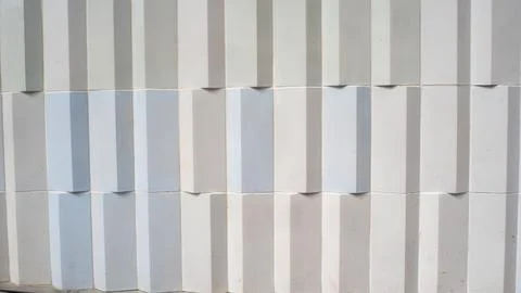 Closeup of a white, modern building patterned design Stock Photos