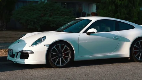 Closeup of a white porshe Stock Footage