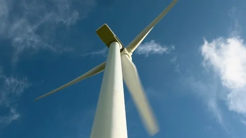 Closeup of wind turbine operating in southern Australia against a blue sky. Stock Footage 87878773