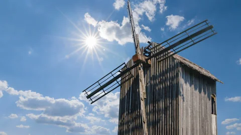 Closeup windmill on sunny sky background Stock Footage 239083709