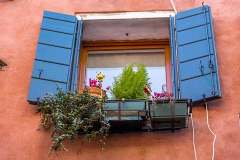 Closeup on windows windows of a typical Venetian house, Italy Stock Photos