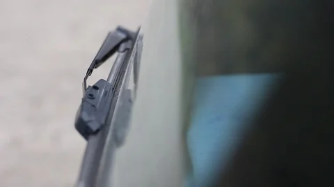 Closeup Of The Windshield Wiper On A Car Stock Footage 99940459
