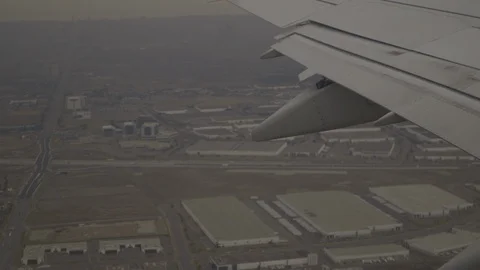 Closeup On Wing Of Plane After Takeoff Stock Footage 118096054