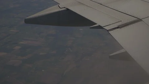 Closeup On Wing Of Plane Flying In The Sky Stock Footage 118096126
