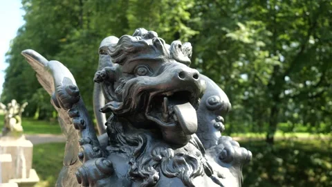 Closeup of winged dragon on Dragon Bridge in Alexander park in Tsarskoye Selo Stock Footage 316471441
