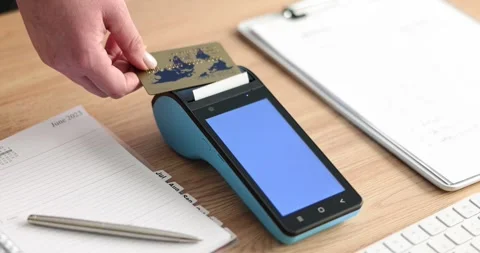 Closeup of wireless modern bank payment terminal for processing and receiving Stock Footage 246997852