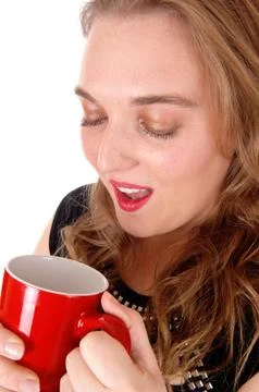 Closeup of woman drinking coffee. Stock Photos