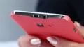 Closeup of woman hands with red smartphone. Woman typing sms on her cell phone HD Footage