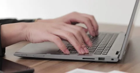 Closeup of woman hands using laptop Video stock 152196607