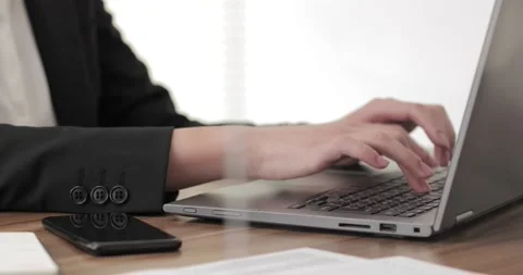 Closeup of woman hands using laptop Stock Footage 152196613