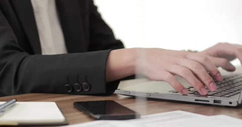 Closeup of woman hands using laptop Stock Footage 152196616