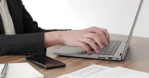 Closeup of woman hands using laptop Stock Footage 152196624