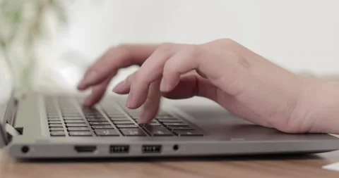 Closeup of woman hands using laptop Stock Footage 152196836