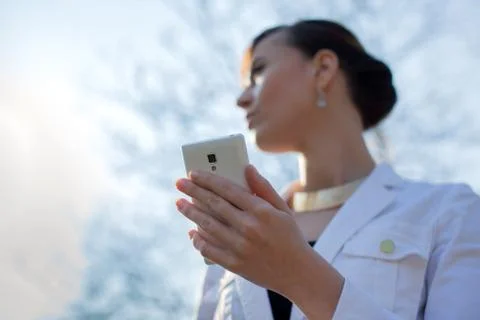 Closeup of woman hands using smartphone Foto stock