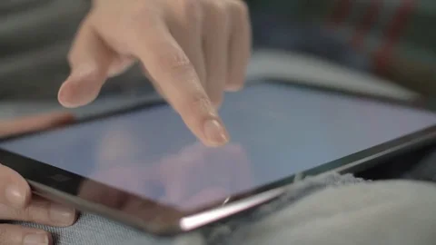 Closeup Of Woman Scrolling Screen On Tablet Computer Stock Footage 79657644