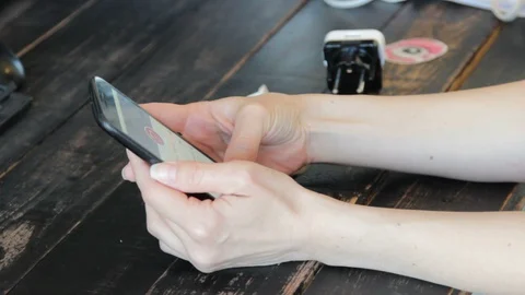 Closeup woman typing message on mobile phone at home office. Stock Footage 129294227