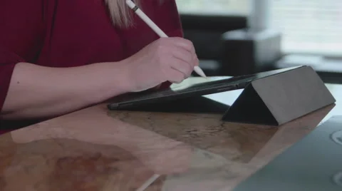 Closeup Woman Using Pencil with iPad Pro in Home Stock Footage 59732002