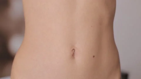 Closeup of woman's flat stomach Stock Footage 62204356