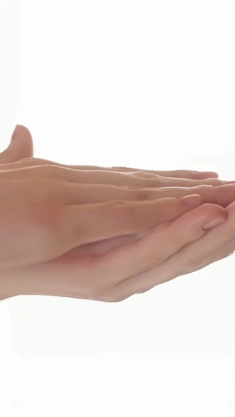 Closeup womans hands with cleansing foam, hand soap, face foam, facial cleanser Stock Footage 312901861