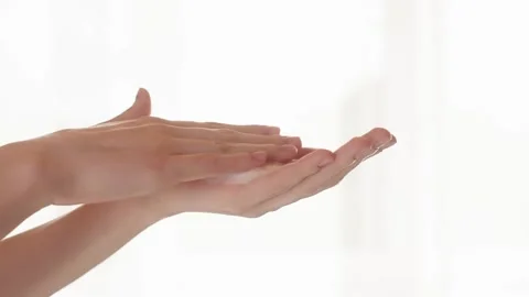 Closeup womans hands with cleansing foam, hand soap, face foam, facial cleanser Stock Footage 312902008