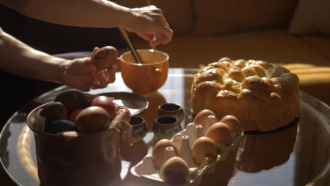 Closeup Of Woman's Hands Painting Easter Eggs, Coloring Eggs, Easter Bread Video stock 128660638