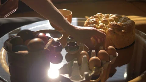 Closeup Of Woman's Hands Painting Easter Eggs, Coloring Eggs, Easter Bread Video stock 128661015