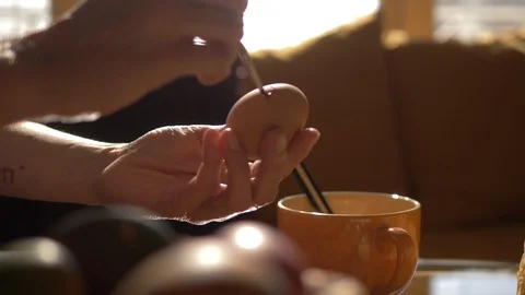 Closeup Of Woman's Hands Painting Easter Eggs, Drawing Red Heart, Coloring Eggs Stock Footage 128673554